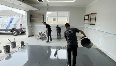Professional garage floor epoxy coating in Louisville KY with durable, glossy finish for lasting protection