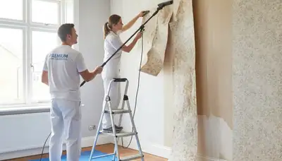 Professional wallpaper removal by house painters in Louisville, KY preparing walls for painting